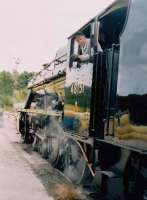 Look back in bemusement: the driver of 48151 checks on, er, something during the Blue Circle cement works Open Day. [See image 58266]<br><br>[Ken Strachan 17/09/2005]