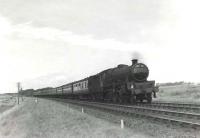 Corkerhill Jubilee 45720 <I>Indomitable</I> at speed near Monkton on 20 July 1959 with a Glasgow St Enoch - Stranraer express. [Ref query 1005]<br><br>[G H Robin collection by courtesy of the Mitchell Library, Glasgow 20/07/1959]