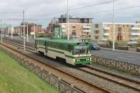<I>Centenary</I> car 648 passes the old Miners' Convalescent Home at Bispham on 170417. For a long time these stylish single deckers ran with modified bodywork [See image 37088] but 648 has been restored to its original condition and looks much better for it. This elevated vantage point is often blocked off for the illuminations tableaux but is open at this time of year. <br><br>[Mark Bartlett 17/04/2017]