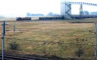 A misty morning at Ravenstruther coal loading terminal in March 2004, looking south east across the WCML.<br><br>[John Furnevel 17/03/2004]