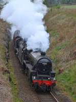 Black Five 45212 and K1 62005 lead the Inverness - Glasgow Central leg of the Great Britain X exiting Kingswood Tunnel, south of Dunkeld and Birnam.<br><br>[Bill Roberton 02/05/2017]