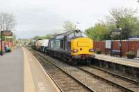 <I>The one and only</I>. The third Northern rail strike on 280417 meant there were no passenger trains on the Morecambe branch. DRS 37259 therefore had a clear run through a near deserted Bare Lane, 40 minutes ahead of schedule. 66301 was the <I>tail</I> loco on this occasion. The couple on the platform had also just come to watch the flasks pass through. <br><br>[Mark Bartlett 28/04/2017]