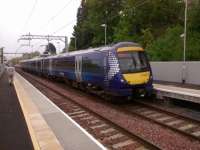 170 471 pulls out of Linlithgow on an Edinburgh to Dunblane service on 02/05/2017. The front of the train is passing the EGIP-ready platform extension.<br><br>[David Panton 02/05/2017]