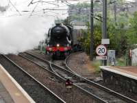 'Flying Scotsman' seen at Slateford pulling out onto the WCML from the Craiglockhart Connection with 1Z44 'Cathedrals Express' for Appleby, running on time after a late start from Waverley was recouped while awaiting the WCML path at Slateford.  Out of sight at the rear of the train is 47746 'Chris Fudge' which provided more assistance in rear once the whole train was on the main line - hence the fairly rapid acceleration away towards Kingsknowe.<br><br>[Alasdair Taylor 16/05/2017]