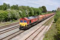 66097 westbound approaching Swindon on 6th May 2017 with empty stone wagons heading for Whatley Quarry via Melksham & Westbury.<br><br>[Peter Todd 05/05/2017]