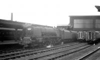 A busy Saturday morning scene at the south end of Carlisle station on 25 July 1964. Stanier Pacific 46241 <I>City of Edinburgh</I> is standing at platform 3 with the 0900 Perth - London Euston.<br><br>[K A Gray 25/07/1964]