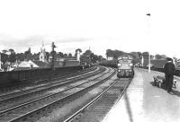 A fine summer Saturday in July 1961 sees Leeds based 'Peak' D19 arriving at Kilmarnock's platform 3 with the down <I>Thames - Clyde Express</i>.<br><br>[G H Robin collection by courtesy of the Mitchell Library, Glasgow 29/07/1961]