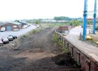 View south from Rome Street bridge, Carlisle, in September 2003. with the trackbed still more or less intact, approximately 20 years after closure of the through goods lines. [See image 57717] <br><br>[John Furnevel 02/09/2003]