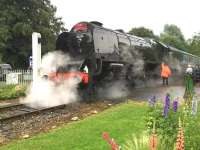 Stanier Pacific 46233 <I>Duchess of Sutherland</I> photographed while negotiating Wymondham Abbey level crossing during a Mid Norfolk Railway Gala event in July 2013. [Ref query 1022]<br><br>[Ian Dinmore /07/2013]