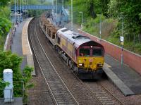 66117 (and DB red 66206) pass Dalgety Bay with the 6K50 Millerhill - Elgin rail train on 20th May 2017.<br><br>[Bill Roberton 20/05/2017]