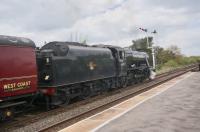 LMS 8F 2-8-0 48151 has the signal to leave Appleby with an excursion from Kidderminster to Carlisle on 10th May 2017. The shunting arm on the bracket signal gives access to Appleby yard, and is still technically the link to the closed/mothballed North Eastern (Warcop) line. <br>
<br><br>[Bruce McCartney 10/05/2017]