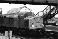 40025, formerly named <I>Lusitania</I>, calls at Helsby with a North Wales to Manchester service in November 1980. Wisps of steam from the front end indicate the boiler is working. Beyond the loco a Park Royal Class 103 DMU can be seen waiting in the adjoining platform to make another shuttle run through Ellesmere Port to Hooton.  <br><br>[Mark Bartlett 22/11/1980]