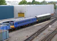 The start of the final week of Chiltern Railways <I>Bubble Car</I> operation shows both units, the last 1st generation DMUs in main line service, parked up at Aylesbury earlier on the Monday afternoon (150517). One will later operate the peak evening services between here and Princes Risborough.<br>
<br>
<br><br>[Douglas Blades 15/05/2017]