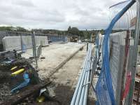 View south through the fence at the new Station Road overbridge on 21st May 2017. Work continues to reinstate the utility services before opening in mid August 2017.<br><br>[Colin McDonald 21/05/2017]