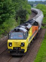 Failure of the booked 60056 in Aberdeen meant Colas had to dispatch 70802 from Grangemouth to bring the cement empties south.  With a friendly wave from the driver, 70802 nears Dysart with 60056 just visible dead on the rear.  29 May.<br><br>[Bill Roberton 29/05/2017]