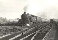 A Glasgow Queen Street - Kirkintilloch local runs through Cowlairs West Junction on 3 April 1956. The train is hauled by Eastfield's Gresley V3 2-6-2T no 67600.<br><br>[G H Robin collection by courtesy of the Mitchell Library, Glasgow 03/04/1956]