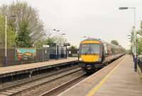 Cross Country 170398 hurries through Willington station, heading towards Derby, on 8th May 2017. Willington closed to passengers in 1968 but reopened in 1994. It is unstaffed but well cared for by a local community group.<br><br>[Mark Bartlett 08/05/2017]