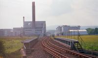 1999 view of the line approaching the Roche Works, Dalry, from Swinlees Junction (some way behind the camera). A distant shunter can (just no more) be seen to the right of the approaching track.<br><br>[Ewan Crawford //1999]