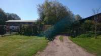 Oxton, looking south towards Lauder. The dirt driveway occupies the trackbed, which forms the driveway to a house on the trackbed.<br><br>[Alan Cormack 10/05/2017]