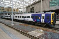 Northern Class 158 waits in one of the two bay platforms at the east end of Manchester Victoria on the afternoon of 19 May 2017. The unit has been internally refurbished and is in the new Northern livery, about to depart to Leeds.<br><br>[John McIntyre 19/05/2017]