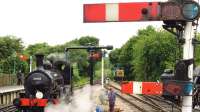 Scene on the Epping & Ongar Railway at North Weald station during a Steam Gala in June 2014. Looking west towards Epping, with Beattie Well Tank 30585 taking water. [Ref query 1043]<br><br>[Ian Dinmore 07/06/2014]