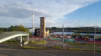 The Pumphouse close to the entry to the former Queens Dock, now the exhibition centre, seen from a passing train. The Clydeside Expressway was formerly the dockside sidings and warehousing. The Pumphouse is undergoing conversion into the new <a href=http://www.theclydeside.com/ target=external>Clydeside Distillery</a>.<br><br>[Beth Crawford 18/05/2017]