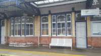 The westbound island platform building seen from an eastbound train at Dumbarton Central.<br><br>[Beth Crawford 22/05/2017]