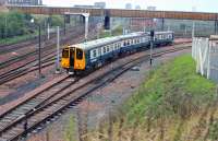 314210 seen at Rutherglen on the occasion of the re-opening of the Glasgow Central Low Level line on 1st November 1979. The Queen is the <I>Second Man</I> in the driving cab. This unit is still in Scotrail service over 37 years later [See image 59498].<br><br>[Ian Millar 01/11/1979]