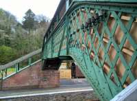 Disused telegraph wire attachments speak eloquently of past glories as a main line at Okehampton station, resplendent in Southern Railway green.<br><br>[Ken Strachan 13/04/2017]