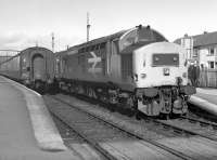 37415 on a southbound train passes and changes crew with a northbound service at Brora. This was taken on 31 March 1989 when the Far North Line was isolated by the Ness Viaduct collapse.<br><br>[Bill Roberton 31/03/1989]