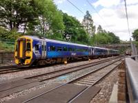 A 4-car 158 takes a Fife service through Princes Street Gardens on 2nd June 2017.<br><br>[David Panton 02/06/2017]