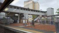 A view of the brutalist architecture at Dalmuir. The flats are a product of their time, but really, the footbridge and platform structures could be more attractive at what is an important interchange.<br><br>[Beth Crawford 22/05/2017]