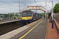 320311 calls at Carluke whilst working a Glasgow to Lanark service on the morning of 29 May 2017.<br><br>[John McIntyre 29/05/2017]