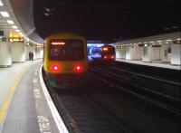 Two EMU's preparing to go back to where they came from, in the stygian depths of New Street station on 13th May 2017.<br><br>[Ken Strachan 13/05/2017]