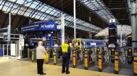 The ticket barriers at high level Queen Street, complete with high visibility Customer Service representative.<br><br>[Beth Crawford 18/05/2017]