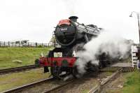 LMS 8F 48624 departing Quorn with a passenger train during the GCR Gala day, specialising in freight trains mixed in with the usual passenger workings. The locos took turns to work either type of train.<br><br>[Peter Todd 06/05/2017]