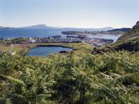 The flooded Ellenabeich Slate Quarry, on Seil, seen from above with Easdale island and its Slate Quarry beyond. Both quarries were served by tramways. But did either system have a locomotive?<br><br>[Bill Roberton //1987]