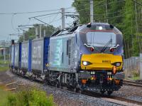 DRS 88003 speeds along the Down Main at Carstairs with the Daventry - Mossend Tesco train on 12 June.<br><br>[Bill Roberton 12/06/2017]