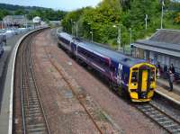 158734 calls at Cupar with a southbound service on 3 June. To the left of the signal box in the background is the Edinburgh, Perth & Dundee goods warehouse, refurbished for commercial use.<br><br>[Bill Roberton 03/06/2017]