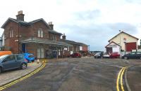 The approach to Stonehaven station from Arduthie Road on 7 June 2017. Opposite the 1849 station building the former goods shed still stands - now operating as Station Motors.<br><br>[Andy Furnevel 07/06/2017]