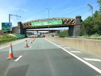 The older bridge taking the R&C line across the A8 at Bargeddie is currently not looking its best, especially when viewed alongside the sleek viaduct constructed in 2015 to take the railway across the M8. However, fans of the 'Cutty Sark' bridge will be pleased that it is about to be refurbished over a period of weeks. Locals may be less pleased by the lane closures which will be necessary for this work. (Photo from dashcam video) <br><br>[Colin McDonald 07/06/2017]