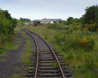 View from the brake van looking towards the depot.  The line meanders through woodland where once were about twenty straight, parallel sidings!<br><br>[Bill Roberton 04/06/2017]