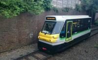 Parry People Mover 139002 descends through the brick lined cutting towards Stourbridge Town station with a morning commuter service from the Junction station on 20th May 2017.<br>
<br><br>[Alan Cormack 20/05/2017]