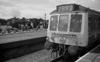 A dmu operating the shuttle service from Aylesbury to Quainton Road to serve the open day. In the background, GWR pannier tank 7715 (latterly London Transport L99) waits at the Brill branch platform with the demonstration train.<br><br>[Bill Roberton //1974]