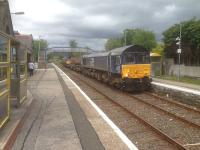 DRS 66301 heads the Flask train from Georgemas to Kingmoor at Brora on 24th May 2017.<br><br>[John Robin 24/05/2017]