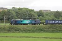 A broadside view of 88003 <I>Genesis</I>, heading north at the Oubeck Loops on 12th June 2017. This was the first Class 88 electro-diesel to haul the <I>Tesco Express</I> and these single locos are replacing double headed diesels. <br><br>[Mark Bartlett 12/06/2017]