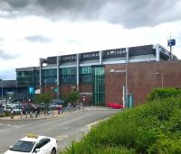 East side elevation of Belfast Central Railway Station on the evening of 12 June 2017. Photograph taken from alongside East Bridge Street, with Mays Meadow car park on the lower level to the left. The modern looking station underwent a major refurbishment between 2000 and 2003.<br><br>[Andy Furnevel 12/06/2017]