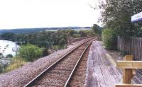 The fenced off wooden platform extension at the south end of Invershin station, looking out onto the Oykel Viaduct in September 2001. Below left is The Kyle of Sutherland, with the Dornoch Firth beyond. [See image 16499]<br><br>[John Furnevel 14/09/2001]