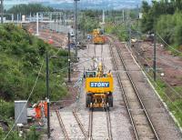 Engineering possession at Millerhill on Sunday 18 June 2017, with work in progress in connection with the planned EGIP electric train depot. The two new sets of points will access the depot, with those nearest routed via a washing plant. All scheduled train movements were cancelled for the day, including those on the Borders Railway, just off picture to the right, where a replacement bus service was in operation between Edinburgh and Gorebridge.<br><br>[John Furnevel 18/06/2017]