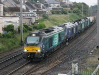 Modern mega power on the flasks. 68017 <I>Hornet</I> leads a veritable convoy of DRS Class 68s on the Crewe Sellafield working on 22nd June 2017. Next in the train is brand new and unnamed 68030 followed by 68005 <I>Defiant</I> and 68023 <I>Achilles</I>. <br><br>[Mark Bartlett 22/06/2017]